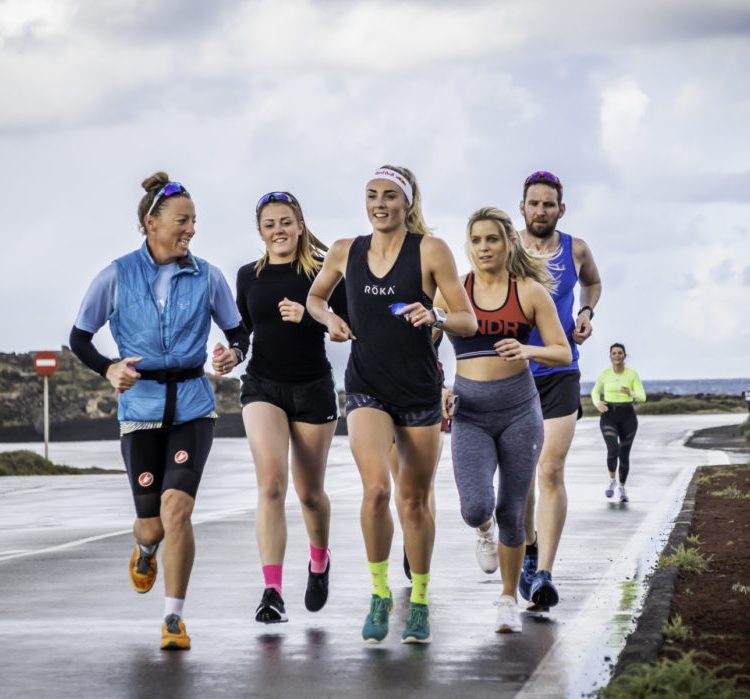 A group run around the club la santa lagoon