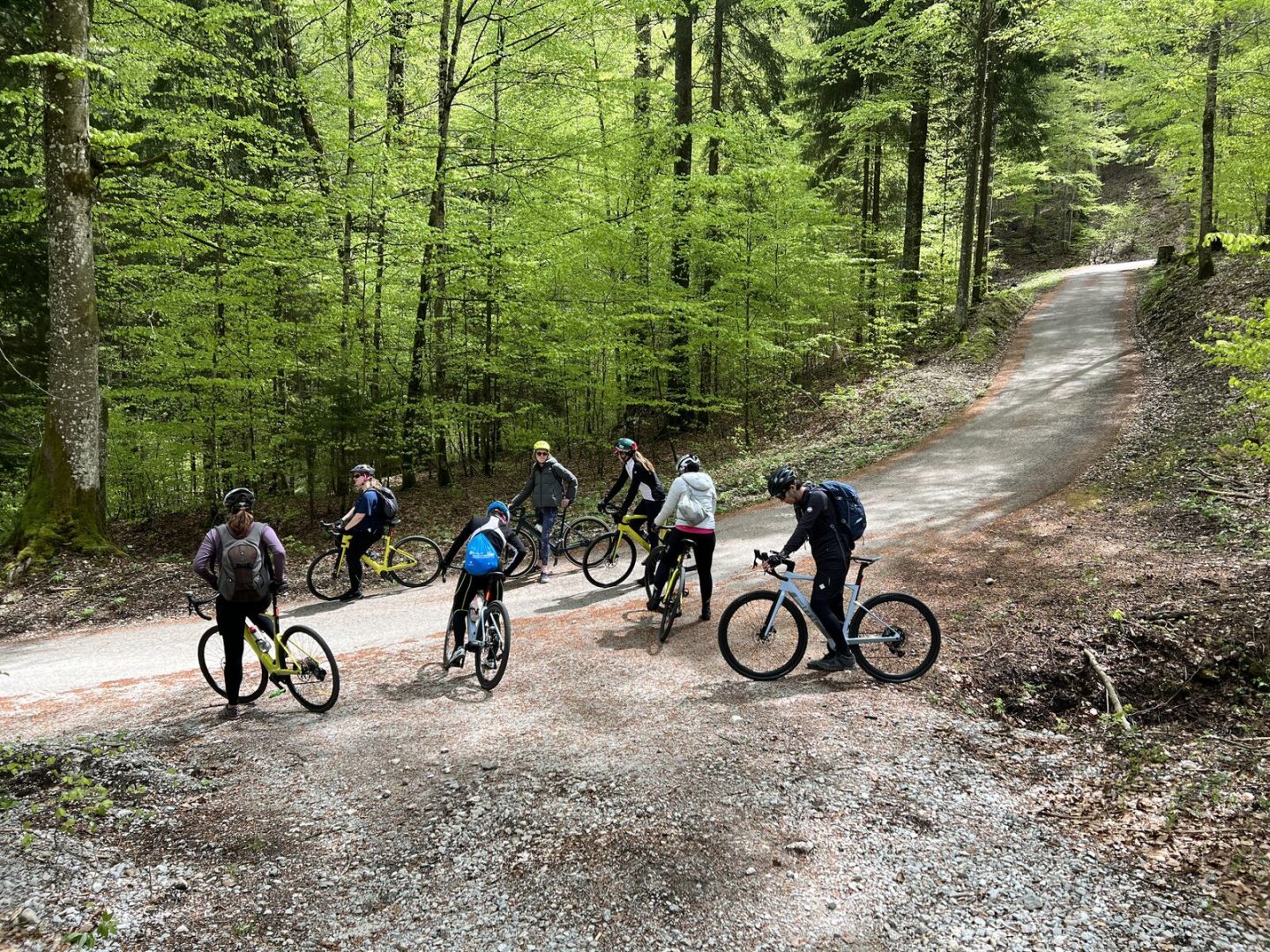 Planning your cycling holiday in Switzerland: group of women preparing to ride a bike 